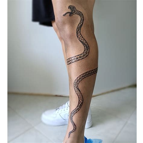 snake wrapped around leg tattoo meaning|Snake Tattoo Meaning (with Images)